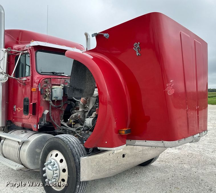 image for item EM2169 1999 International 9300 semi truck