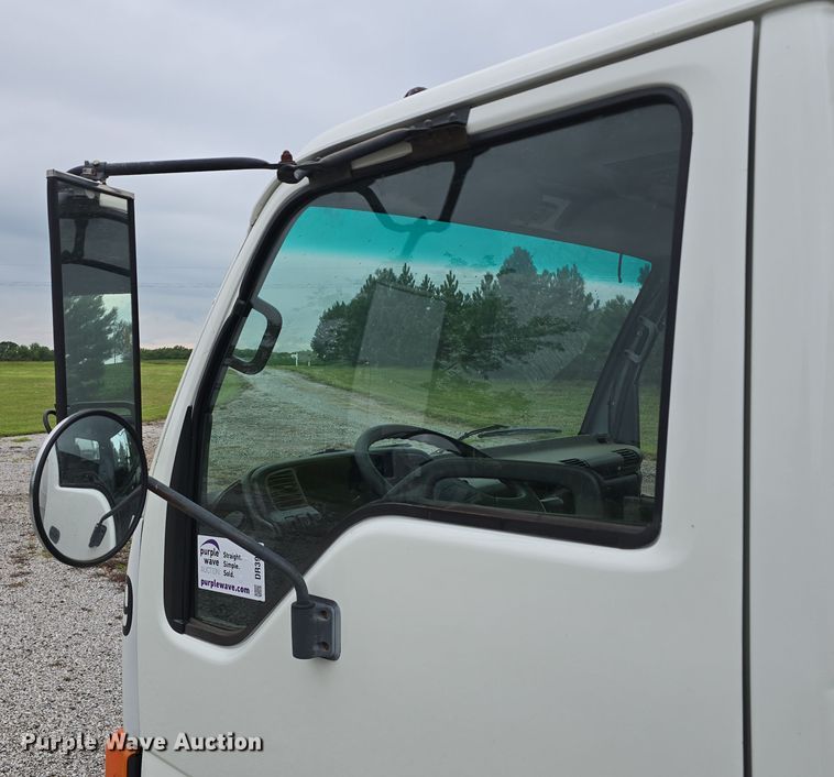 image for item DR3944 2001 Isuzu NPR refuse truck