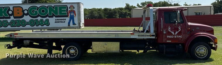 image for item DW5125 1999 International 4700 rollback truck