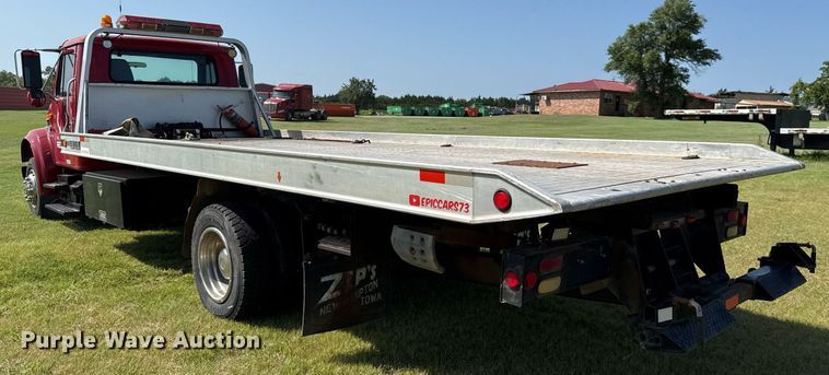 image for item DW5125 1999 International 4700 rollback truck