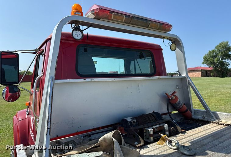image for item DW5125 1999 International 4700 rollback truck