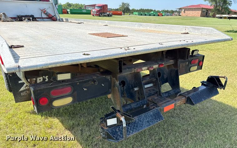 image for item DW5125 1999 International 4700 rollback truck