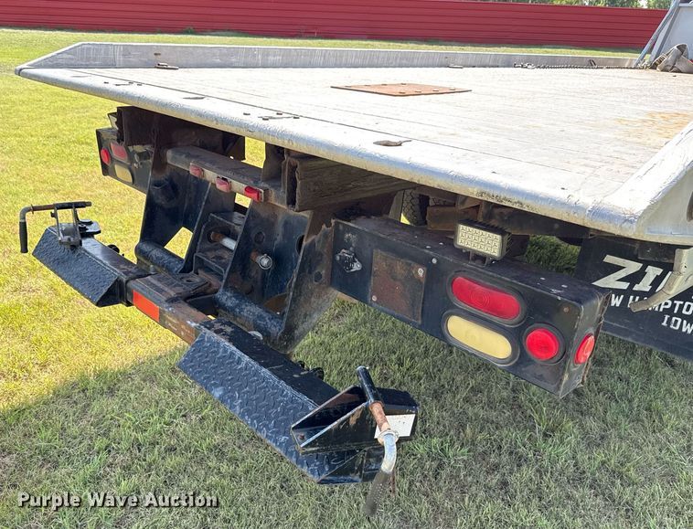 image for item DW5125 1999 International 4700 rollback truck