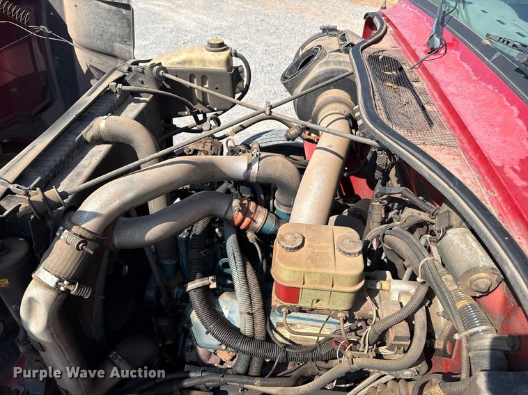 image for item DW5125 1999 International 4700 rollback truck