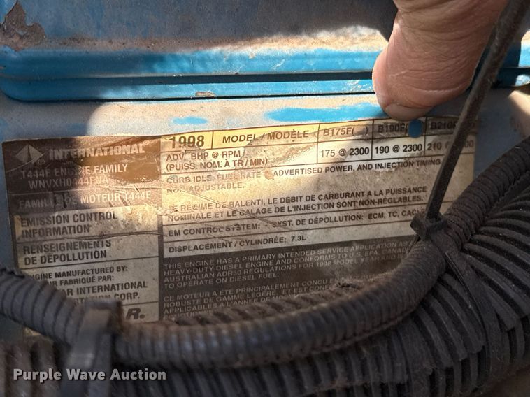 image for item DW5125 1999 International 4700 rollback truck