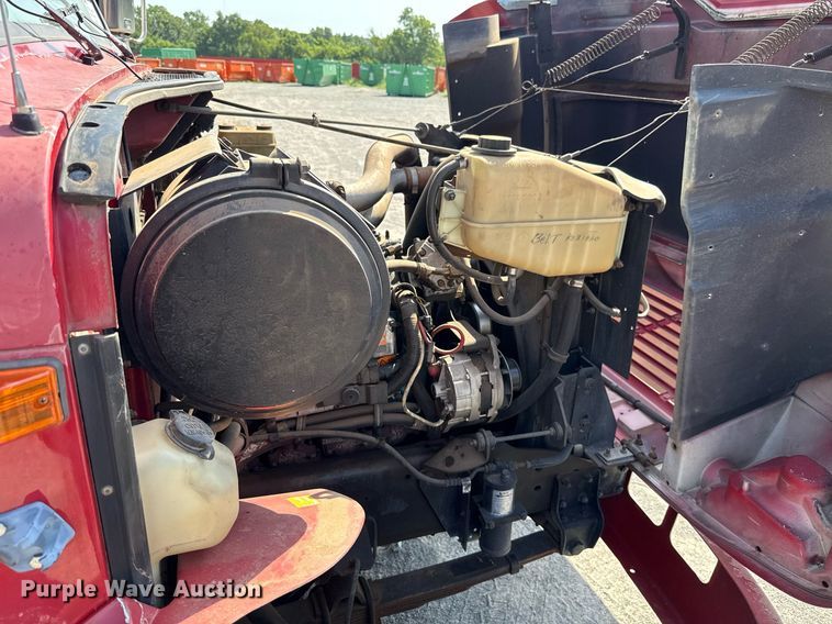 image for item DW5125 1999 International 4700 rollback truck