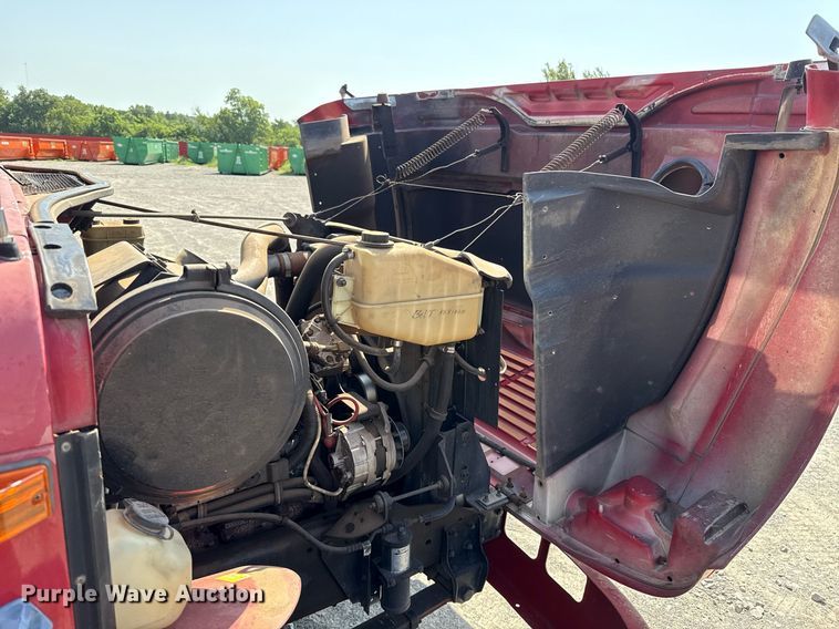 image for item DW5125 1999 International 4700 rollback truck