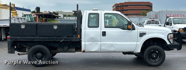 image for item EK8382 2009 Ford F250 Super Duty SuperCab flatbed pickup truck