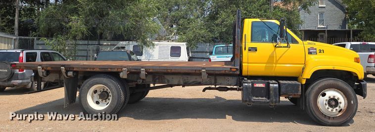 image for item EN8344 1999 GMC C7 flatbed truck