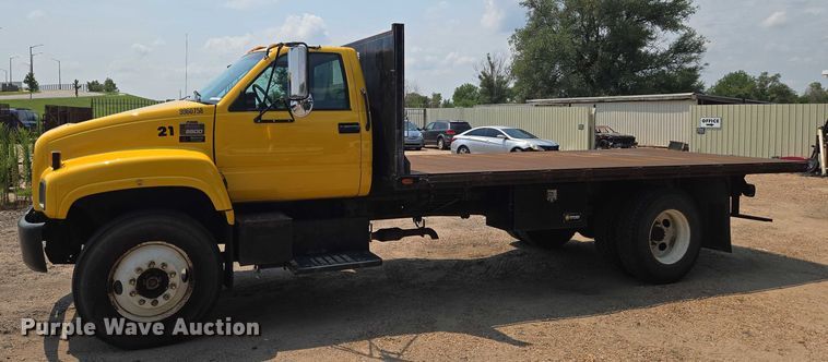 image for item EN8344 1999 GMC C7 flatbed truck