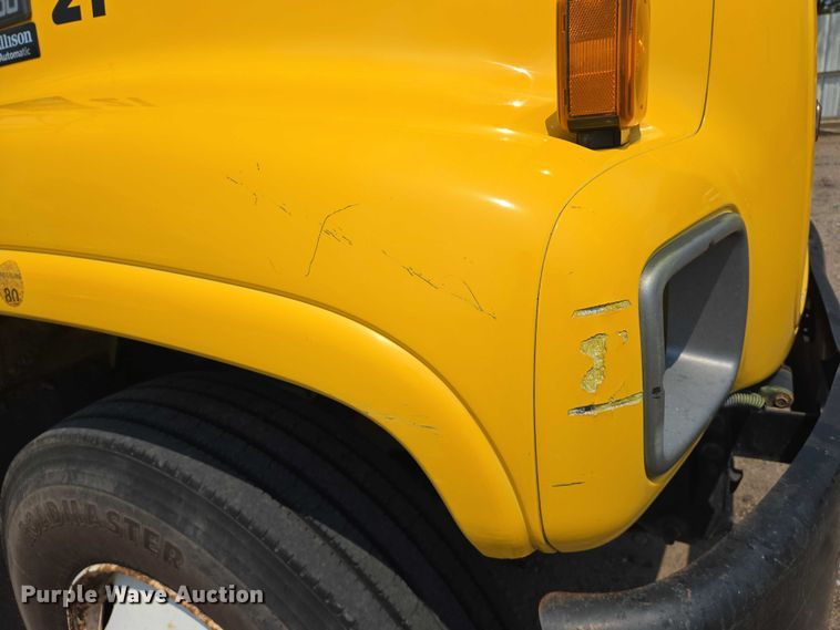 image for item EN8344 1999 GMC C7 flatbed truck