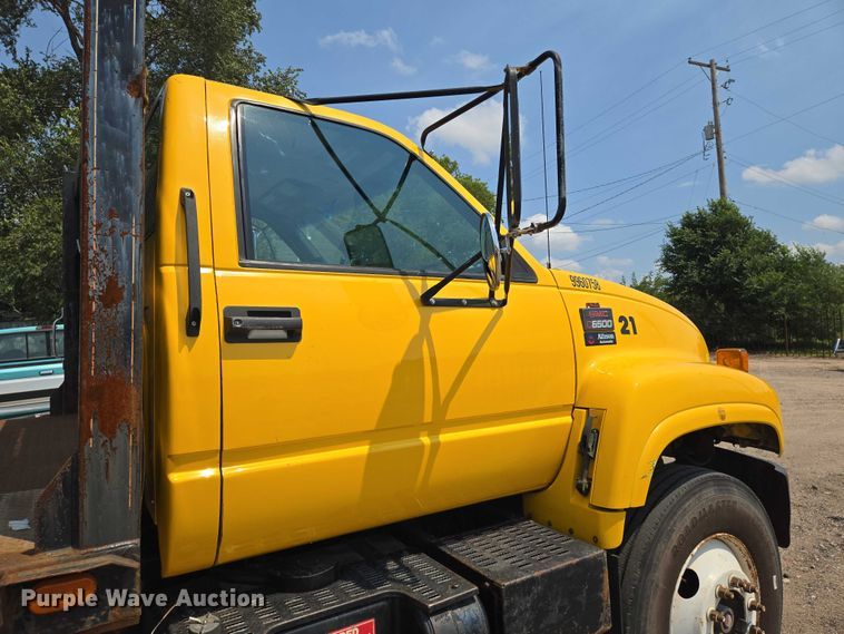 image for item EN8344 1999 GMC C7 flatbed truck