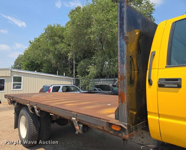 image for item EN8344 1999 GMC C7 flatbed truck