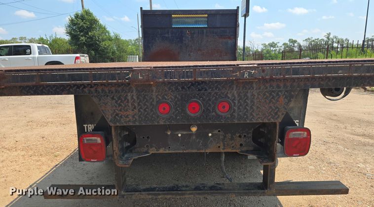 image for item EN8344 1999 GMC C7 flatbed truck