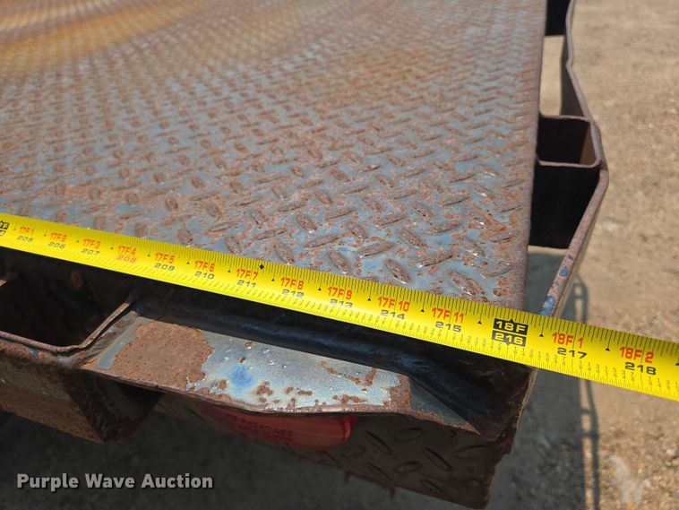 image for item EN8344 1999 GMC C7 flatbed truck