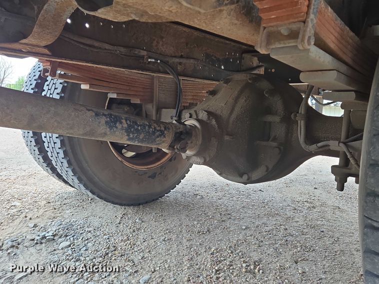 image for item EN8344 1999 GMC C7 flatbed truck