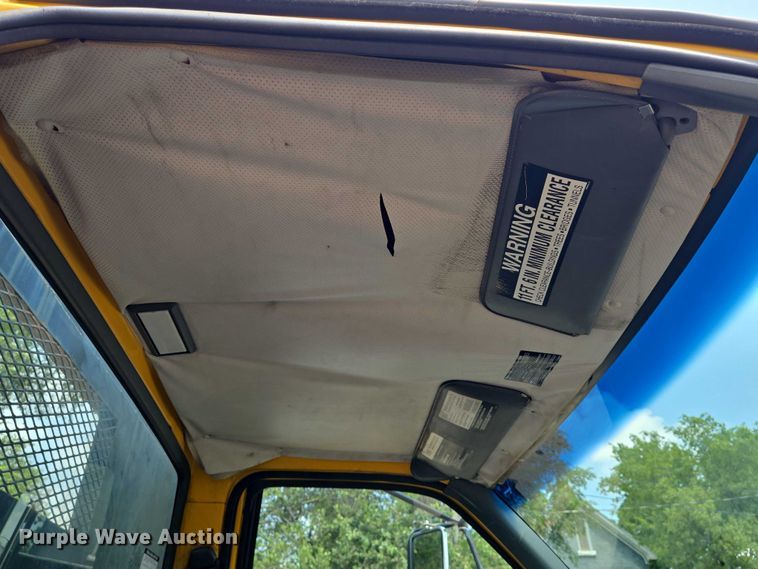 image for item EN8344 1999 GMC C7 flatbed truck