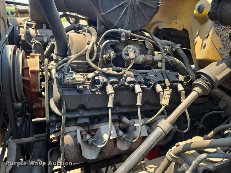 image for item EN8344 1999 GMC C7 flatbed truck