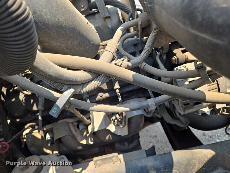 image for item EN8344 1999 GMC C7 flatbed truck