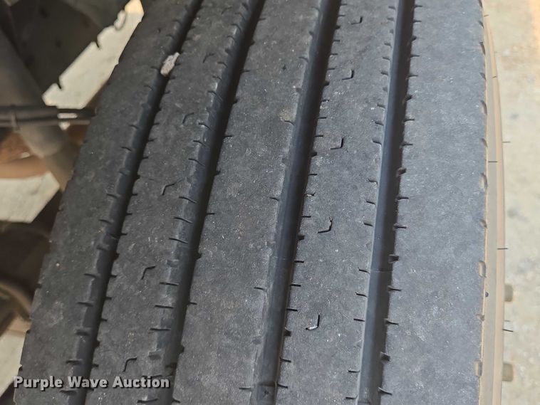 image for item EN8344 1999 GMC C7 flatbed truck