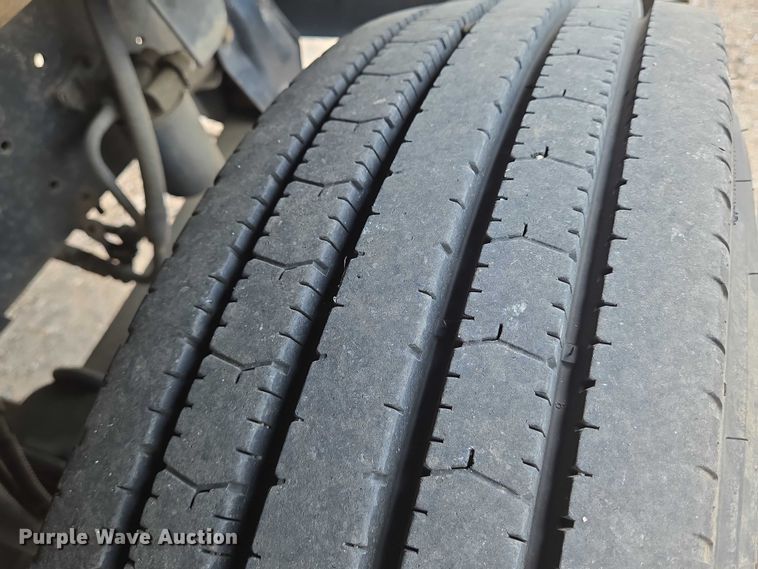 image for item EN8344 1999 GMC C7 flatbed truck