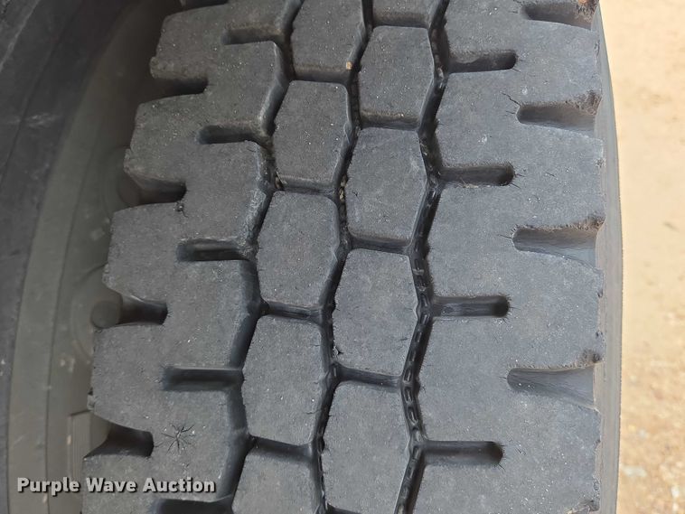 image for item EN8344 1999 GMC C7 flatbed truck