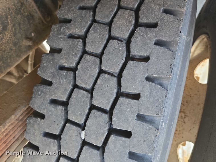 image for item EN8344 1999 GMC C7 flatbed truck