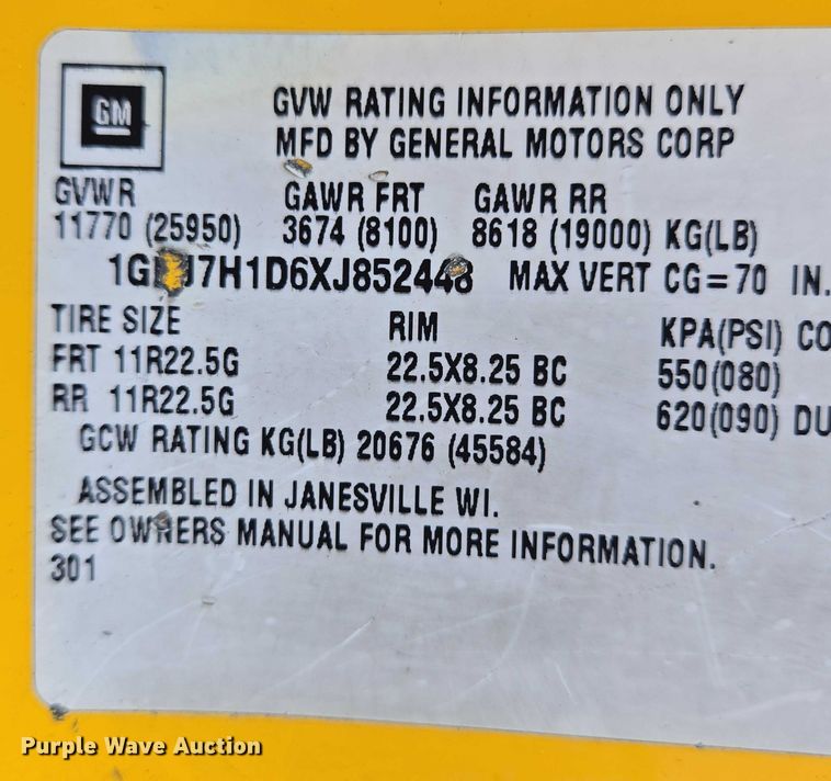 image for item EN8344 1999 GMC C7 flatbed truck