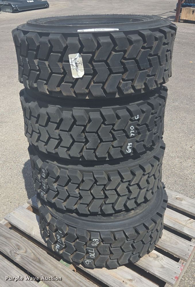image for item EQ4116 (4) Bobcat 10-16.5 skid steer tires and wheels
