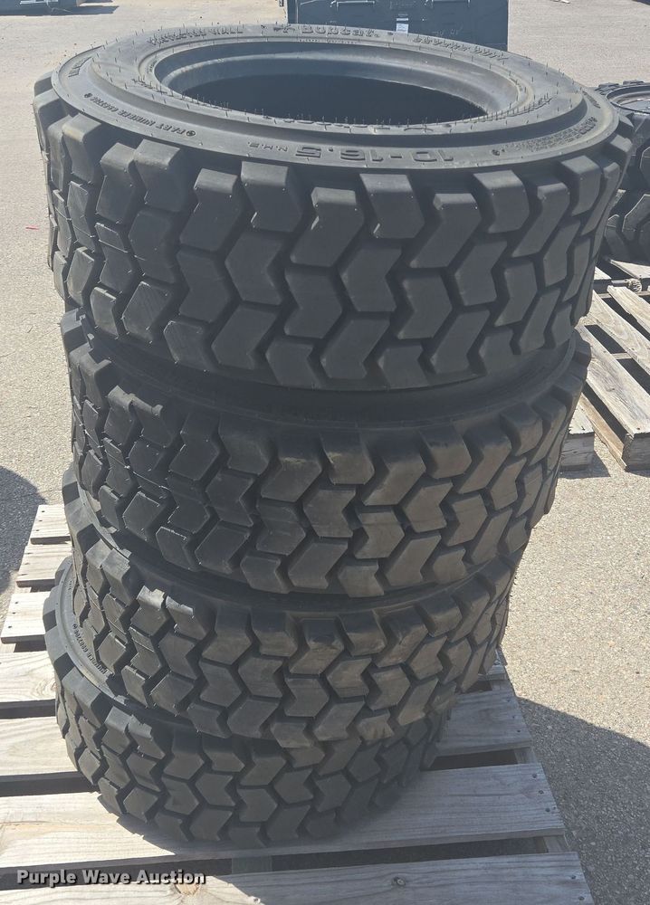 image for item EQ4116 (4) Bobcat 10-16.5 skid steer tires and wheels