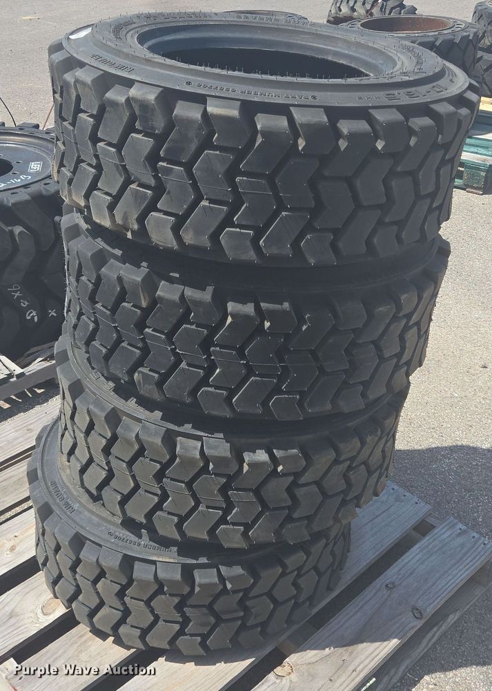 image for item EQ4116 (4) Bobcat 10-16.5 skid steer tires and wheels