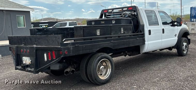 image for item FB9438 2014 Ford F550 Super Duty Crew Cab flatbed truck