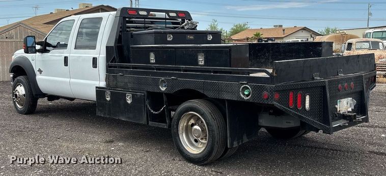 image for item FB9438 2014 Ford F550 Super Duty Crew Cab flatbed truck