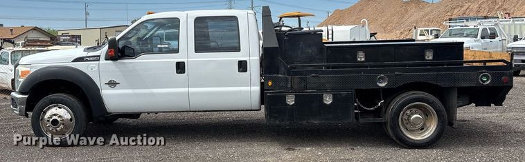 image for item FB9438 2014 Ford F550 Super Duty Crew Cab flatbed truck