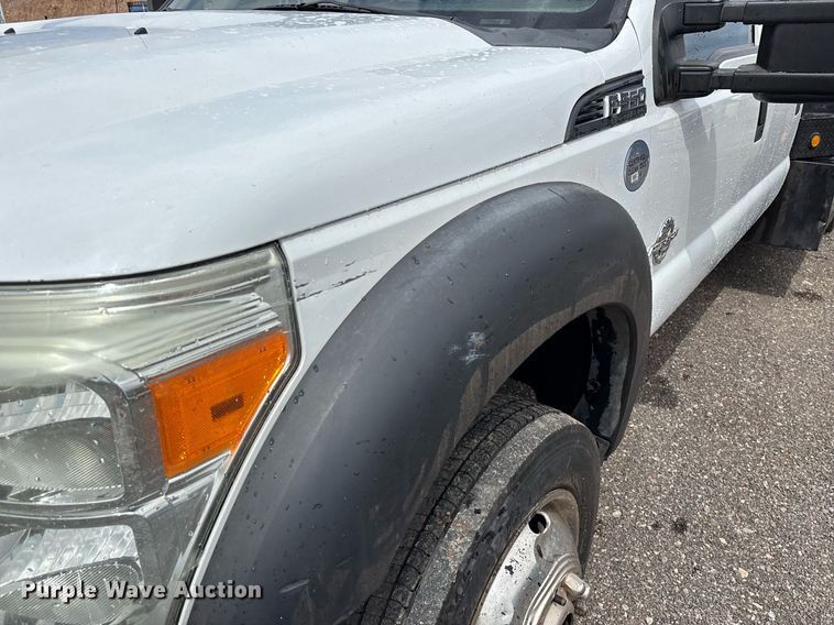 image for item FB9438 2014 Ford F550 Super Duty Crew Cab flatbed truck