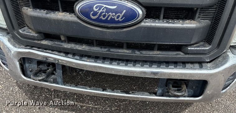 image for item FB9438 2014 Ford F550 Super Duty Crew Cab flatbed truck