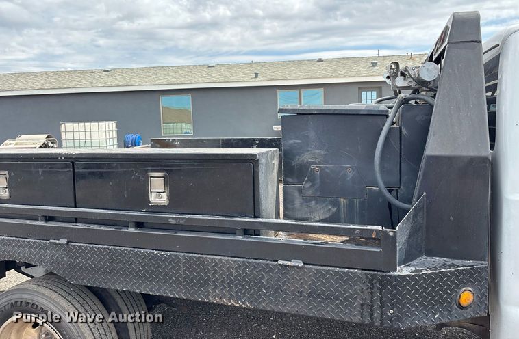 image for item FB9438 2014 Ford F550 Super Duty Crew Cab flatbed truck