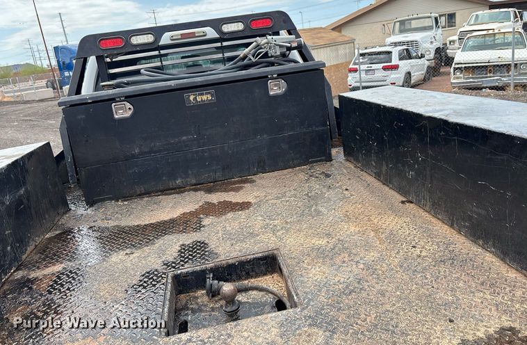 image for item FB9438 2014 Ford F550 Super Duty Crew Cab flatbed truck