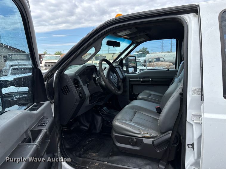 image for item FB9438 2014 Ford F550 Super Duty Crew Cab flatbed truck