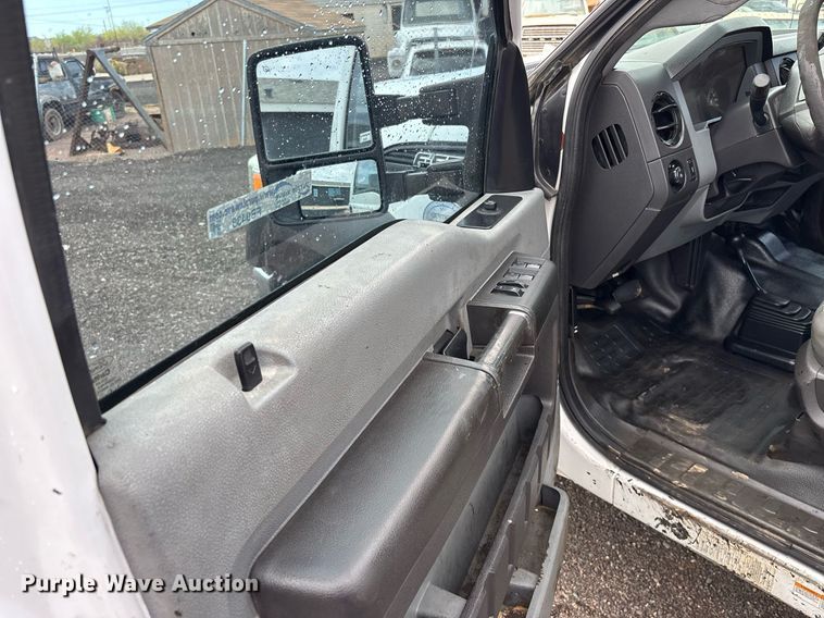 image for item FB9438 2014 Ford F550 Super Duty Crew Cab flatbed truck