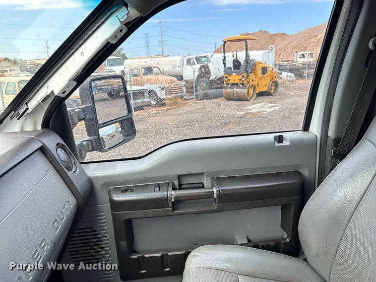 image for item FB9438 2014 Ford F550 Super Duty Crew Cab flatbed truck