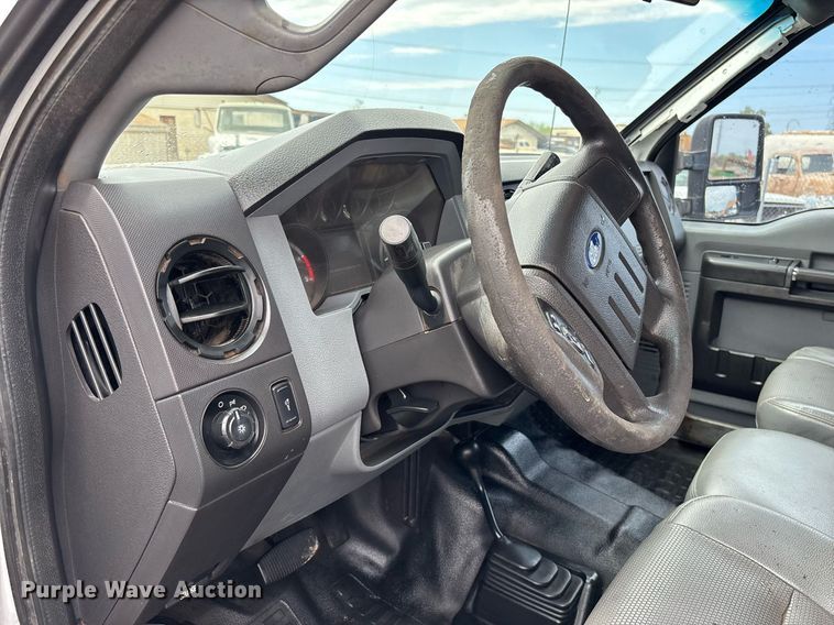 image for item FB9438 2014 Ford F550 Super Duty Crew Cab flatbed truck