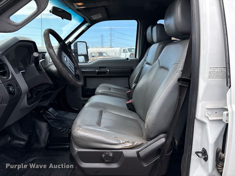 image for item FB9438 2014 Ford F550 Super Duty Crew Cab flatbed truck