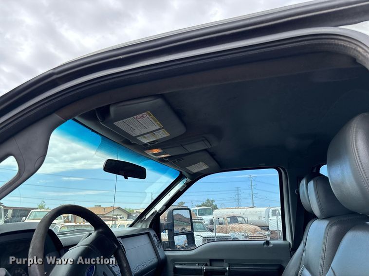 image for item FB9438 2014 Ford F550 Super Duty Crew Cab flatbed truck