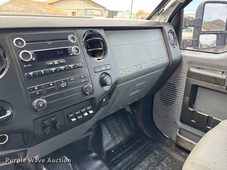 image for item FB9438 2014 Ford F550 Super Duty Crew Cab flatbed truck