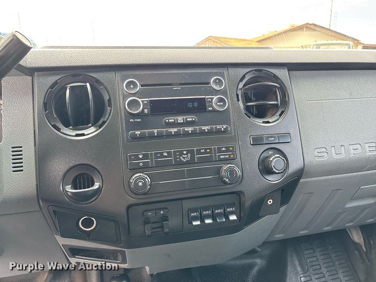 image for item FB9438 2014 Ford F550 Super Duty Crew Cab flatbed truck