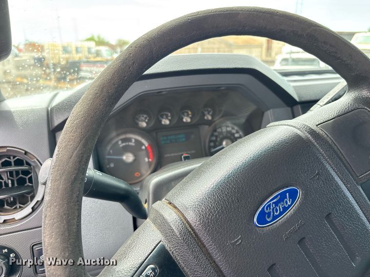 image for item FB9438 2014 Ford F550 Super Duty Crew Cab flatbed truck