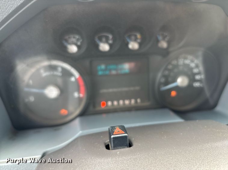 image for item FB9438 2014 Ford F550 Super Duty Crew Cab flatbed truck