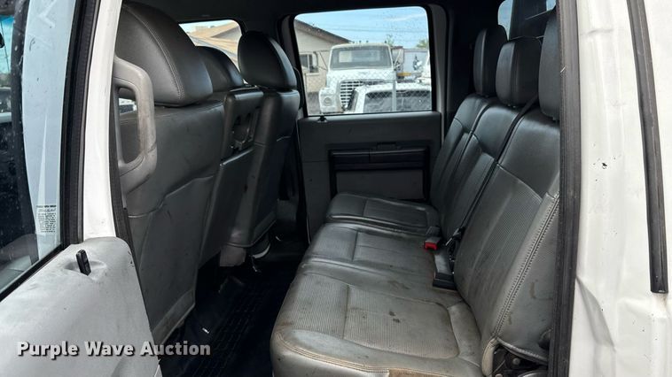 image for item FB9438 2014 Ford F550 Super Duty Crew Cab flatbed truck