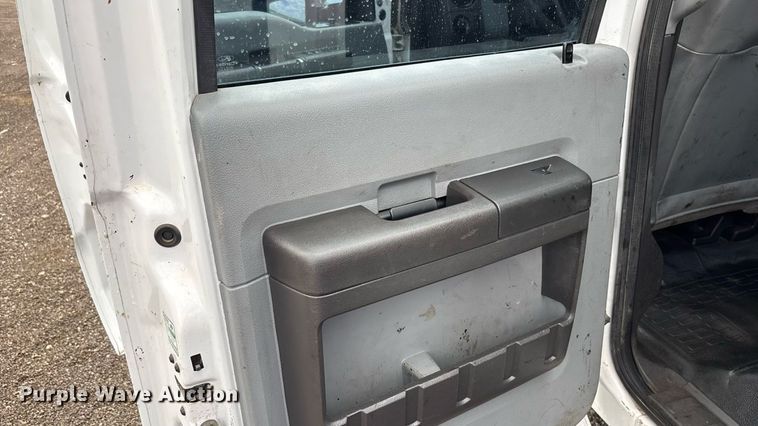 image for item FB9438 2014 Ford F550 Super Duty Crew Cab flatbed truck